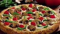 Domino's Tops Revenue Estimates as Supply-Chain Business Offsets Weak Demand
