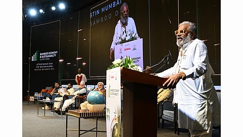 Pasha Patel speaks at the Summit as Governor Jishnu Dev Varma, Minister Bharat Sheth Gogawale and Dr. Faruk Patel look on.