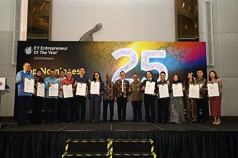 Minister of Entrepreneur and Cooperatives Development Steven Sim Chee Keong (eighth from right) with Top Nominees for the EY Entrepreneur Of the Year 2026 Malaysia awards