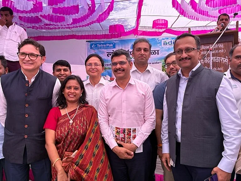 Gajanan Patil, CEO, Zilla Parishad Pune, joined Tetra Pak leaders at the IWRDM Programme community handover in Khed, Pune - null