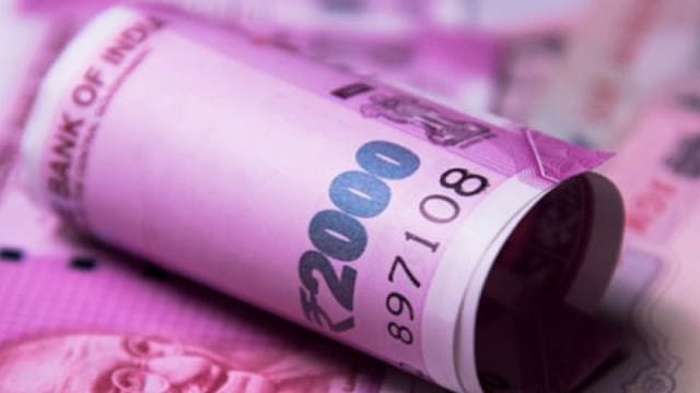 Rupee Drops 8 Paise to Close at 84.74 Against US Dollar