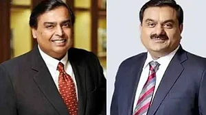 Mukesh Ambani (L) has become the richest Indian again
