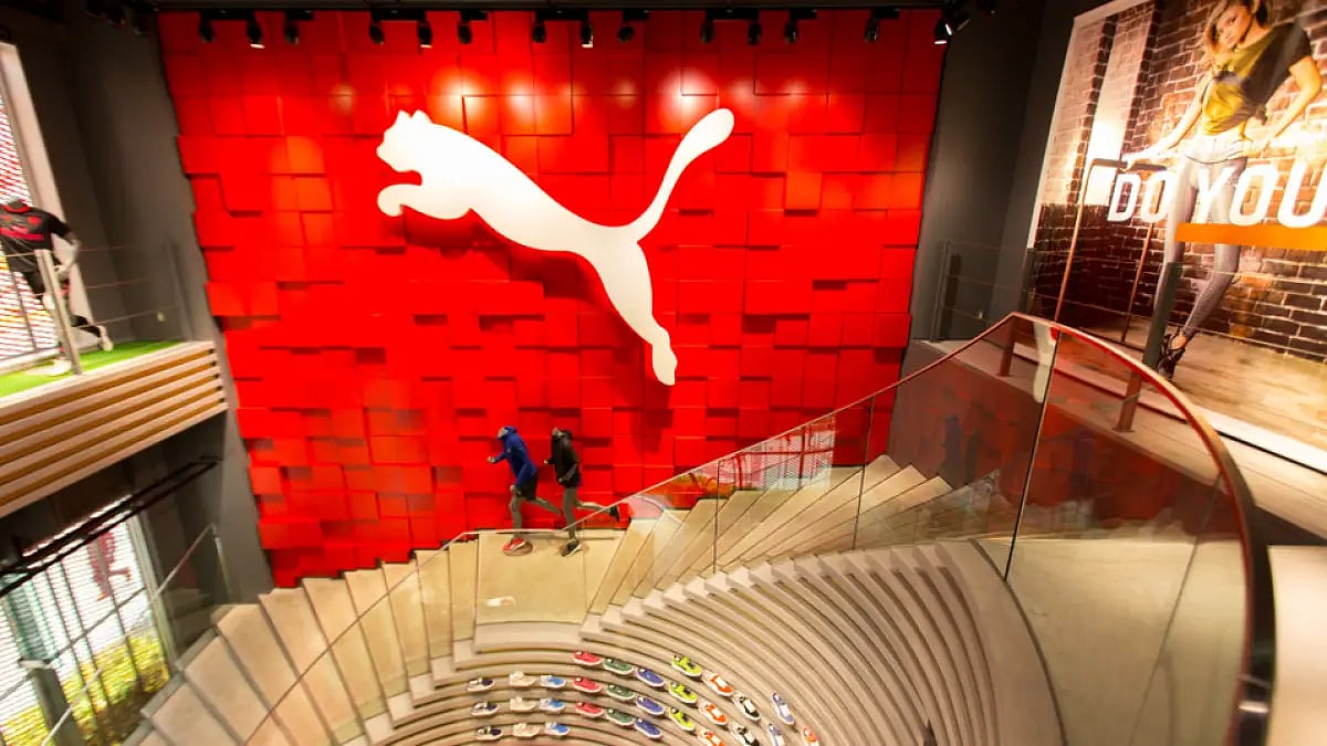 Puma logo is displayed on the wall