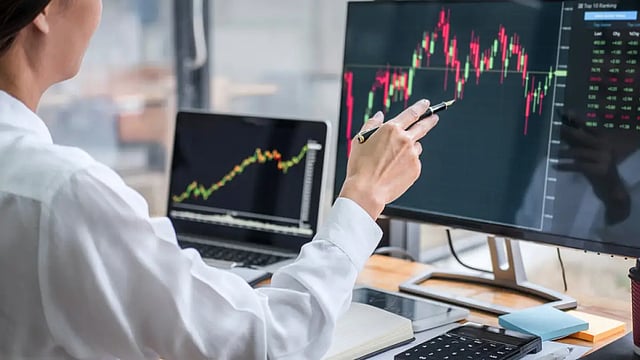 Sensex, Nifty Settle On A Mixed Note In Volatile Trade