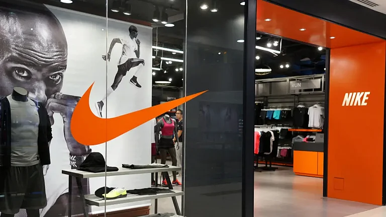 Nike logo is displayed outside a store - null