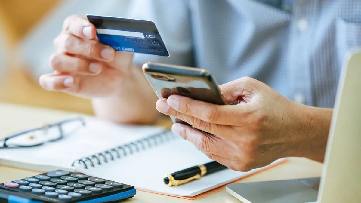 Why do financially constrained people waste money on discretionary spending?