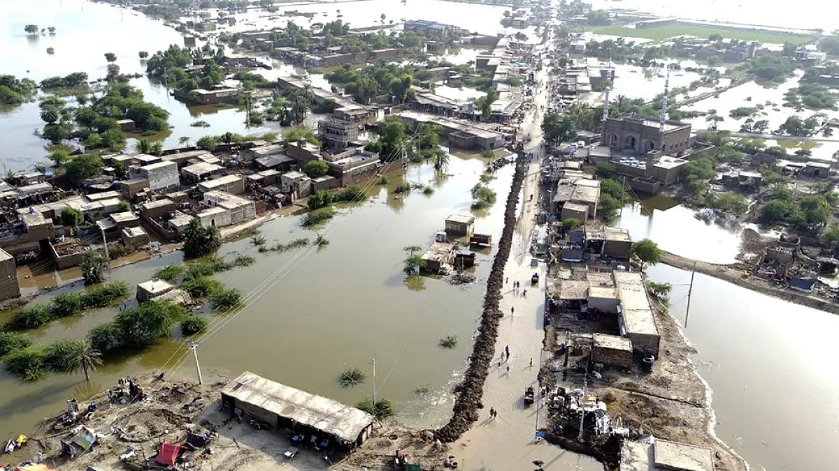Homes are surrounded by floodwaters in Pakistan
