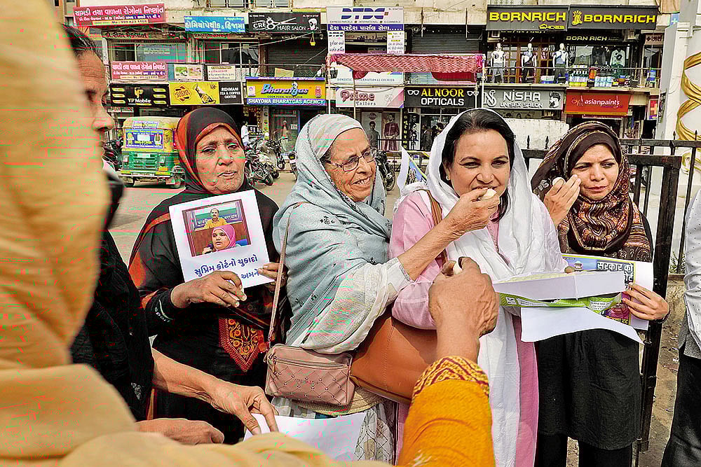 Photo: PTI : Justice Delivered: Muslim women celebrate in Ahmedabad after the Supreme Court’s recent order in the Bilkis Bano case 