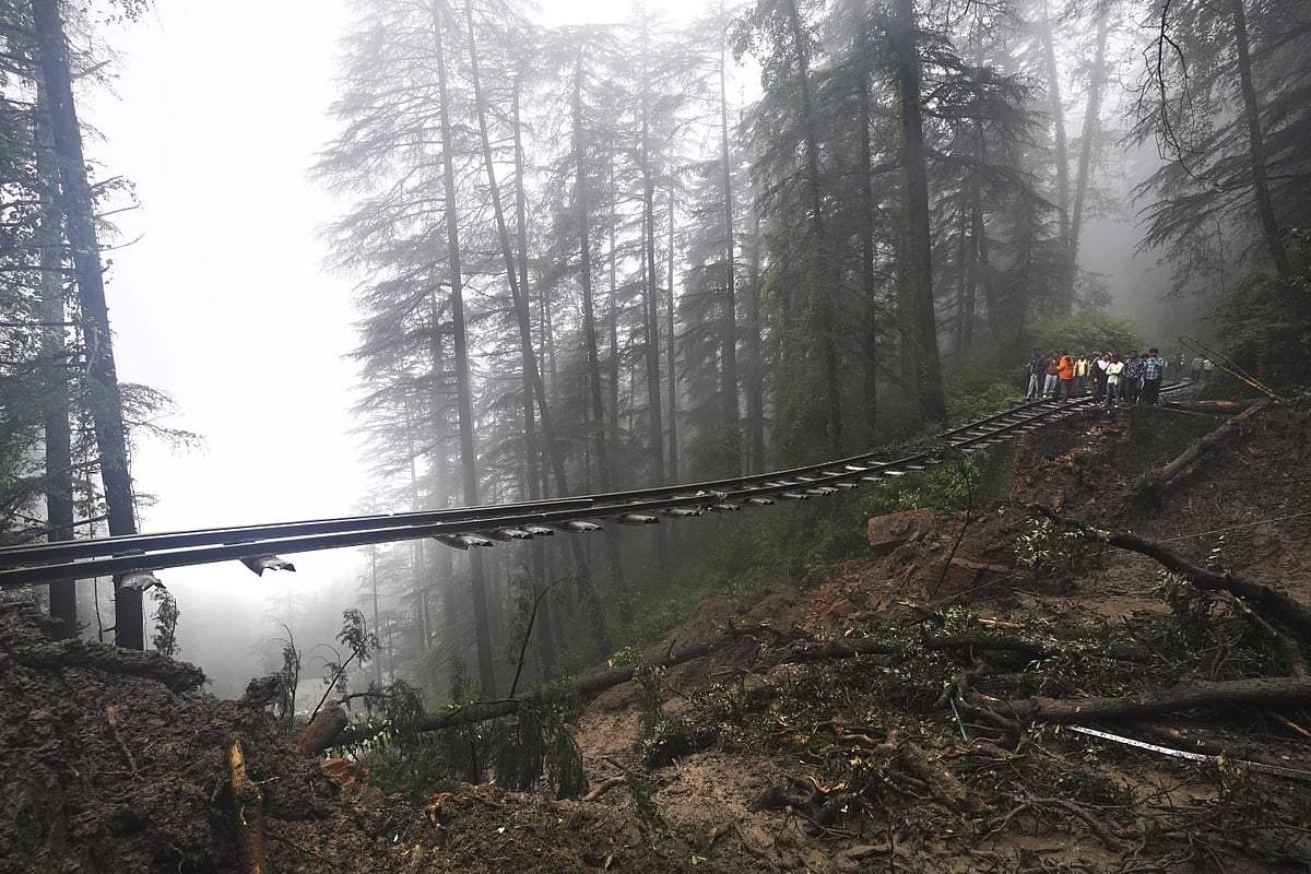 A portion of the Shimla-Kalka heritage railway track that got washed away following heavy rainfall on the outskirts of Shimla, Himachal Pradesh, in August 2023. - Credit: Associated Press