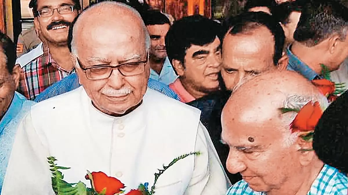 Photo: PTI : A Warm Welcome: Shanta Kumar greets senior BJP leader L K Advani at Kangra airport 