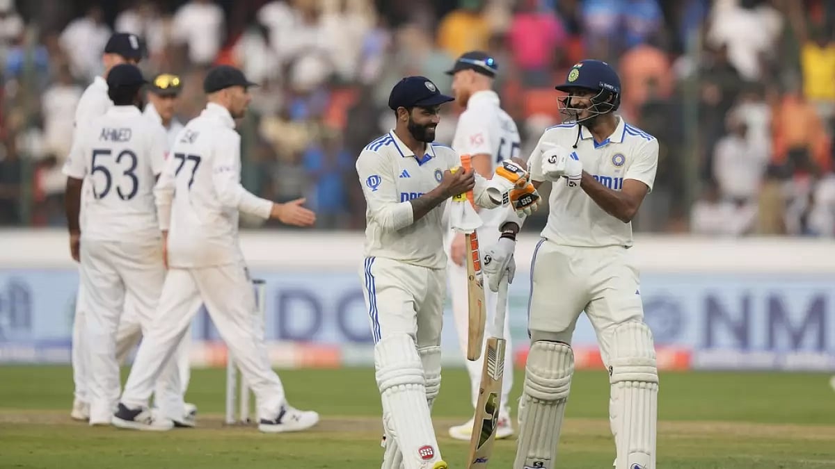 AP : India's Ravindra Jadeja left in the foreground, and Axar Patel walk to the pavilion at the end of the second day of the first cricket test match between England and India in Hyderabad
