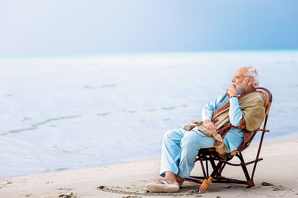 Camera Friendly: Modi likes to be photographed alone and the media obliges by keeping only him in the frame to the best of their ability