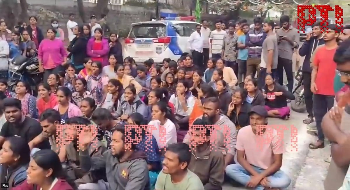 PTI : students of Osmania University stage protest against security breach in girls hostel.