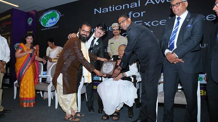 Best astrologer in India award received by governor of India Biswa bhushan haricharan.