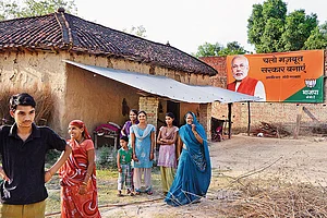 Photo: Nirala Tripathi : Dominating Presence: A billboard of PM Modi in Pure Khushiyal village in Amethi