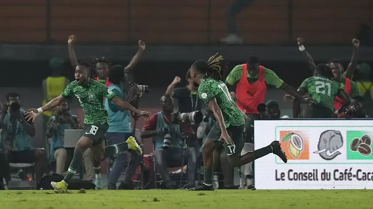 Ademola Lookman, left, celebrates with teammates after scoring his side's second goal during the African Cup of Nations round of 16 football match between Nigeria and Cameroon, at the Felix Houphouet Boigny stadium in Abidjan, Ivory Coast - AP