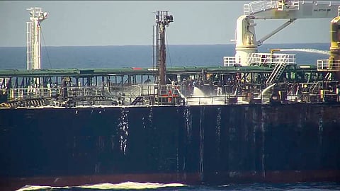 Navy puts out fire on attacked ship