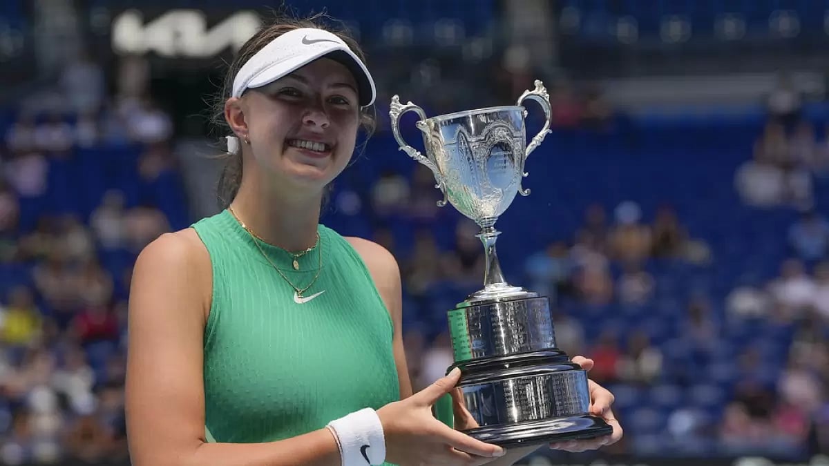 AP : Renata Jamrichova of Slovakia poses with her trophy after defeating Emerson Jones of Australia in the girls final at the Australian Open tennis championships at Melbourne Park