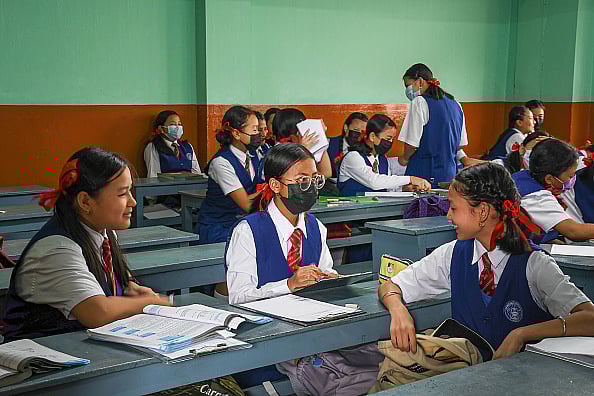 Representative Image/Getty Images : Students seat at their desks inside class