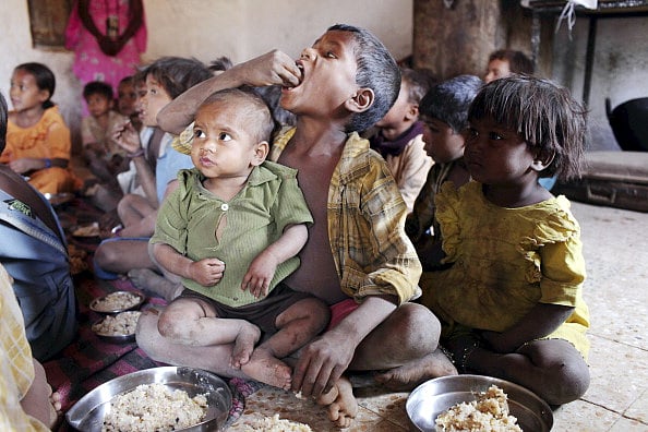 Getty Images : An NGO called Spandan feeds local children in Madhya Pradesh whose parents cannot afford food.