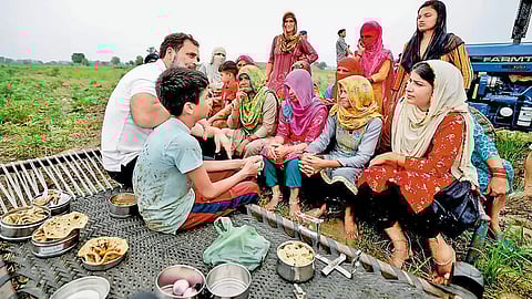 Gandhi interacting with women farmers at Sonipat, Haryana