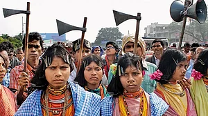 Getty Images : Tribal people protest against the poor implementation of the Forest Rights Act in Bhubaneswar.