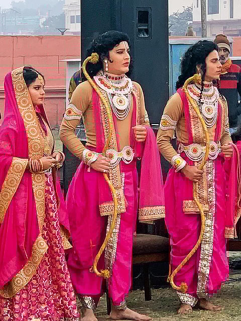 Actors dressed as Ram, Lakshman and Sita on the set of a TV news debate on Ram ki Paidi in Ayodhya
