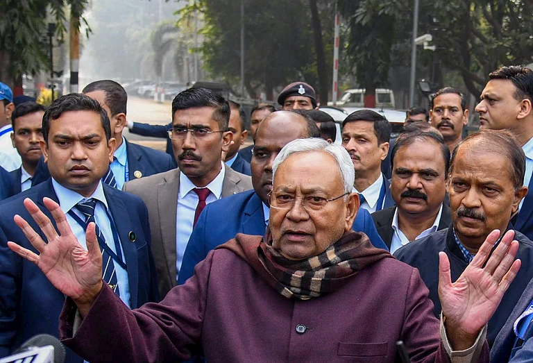 JD(U) chief Nitish Kumar speaks with the media after submitting his resignation - PTI