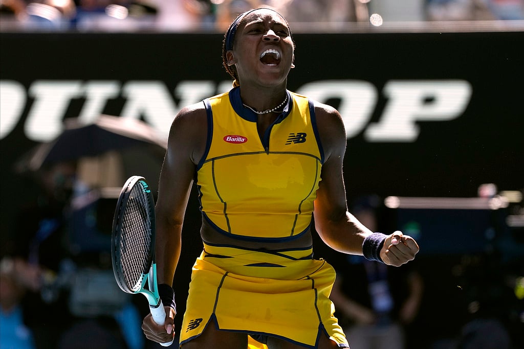 (AP Photo/Alessandra Tarantino) : Coco Gauff of the U.S. celebrates after defeating Marta Kostyuk of Ukraine in their quarterfinal match at the Australian Open tennis championships at Melbourne Park, Melbourne, Australia, Tuesday, Jan. 23, 2024