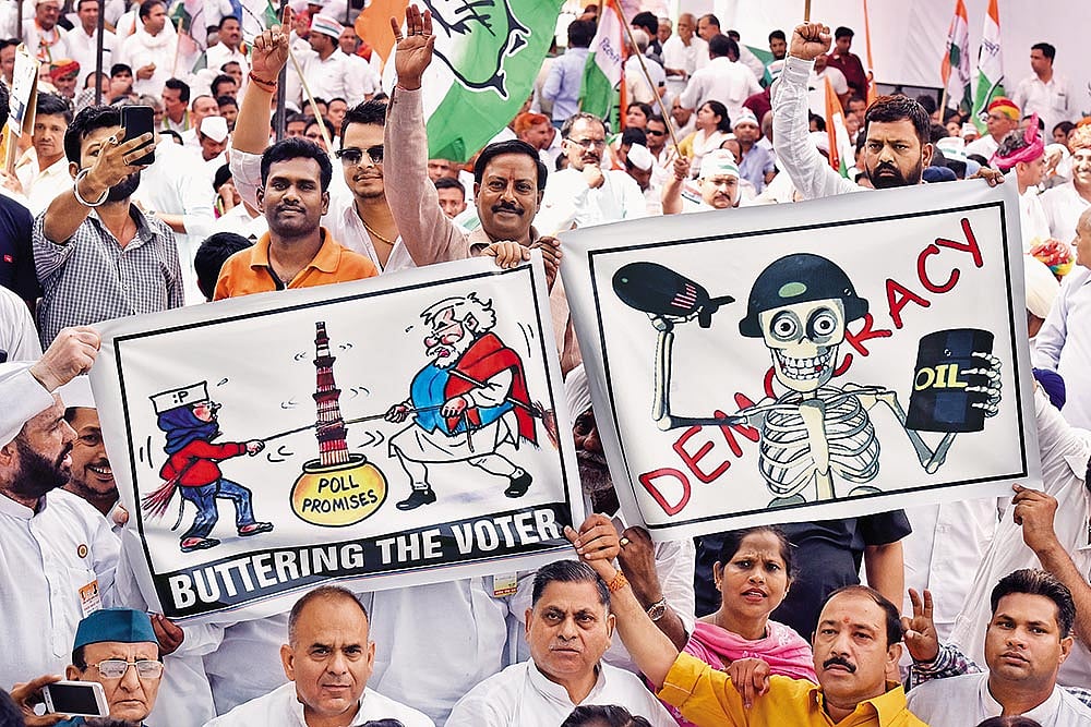 Photo: Getty Images : Deepening Fissures: A ‘Save Democracy’ march held by the Congress party at Delhi in 2016
