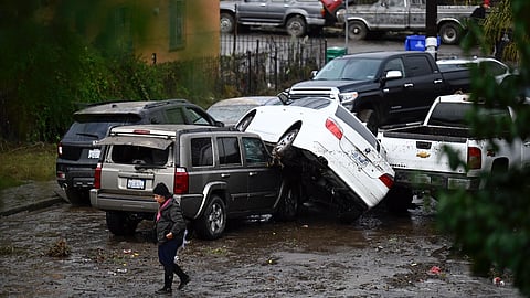 Cars damaged by floods during a rainstorm in San Diego on Monday.
