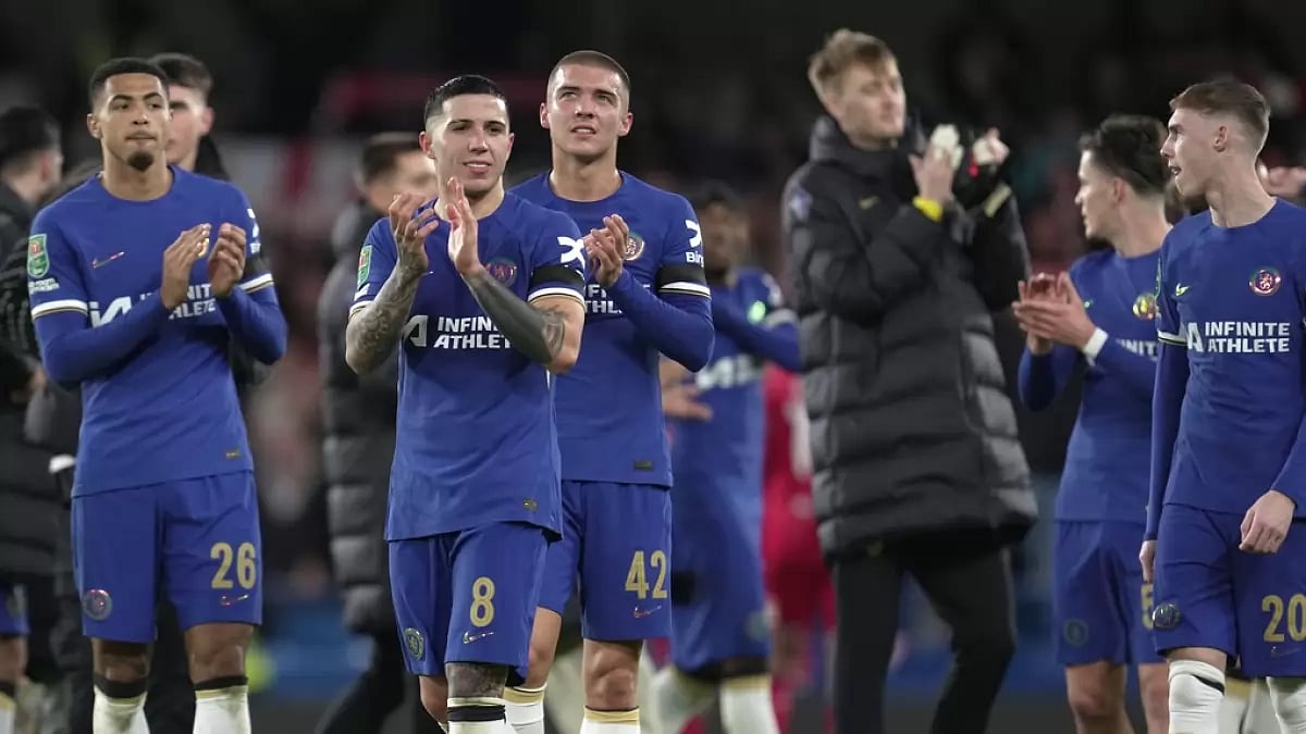 AP : Chelsea's players celebrate after their English League Cup semi-final second leg football match against Middlesbrough at the Stamford Bridge stadium in London