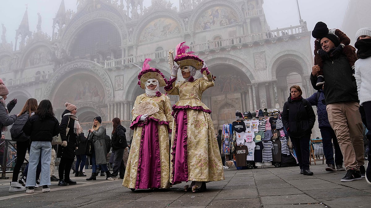 Masked Revelers, Traditional Dresses, And Street Performers Illuminate Streets In Homage To Marco Polo's 700th Anniversary