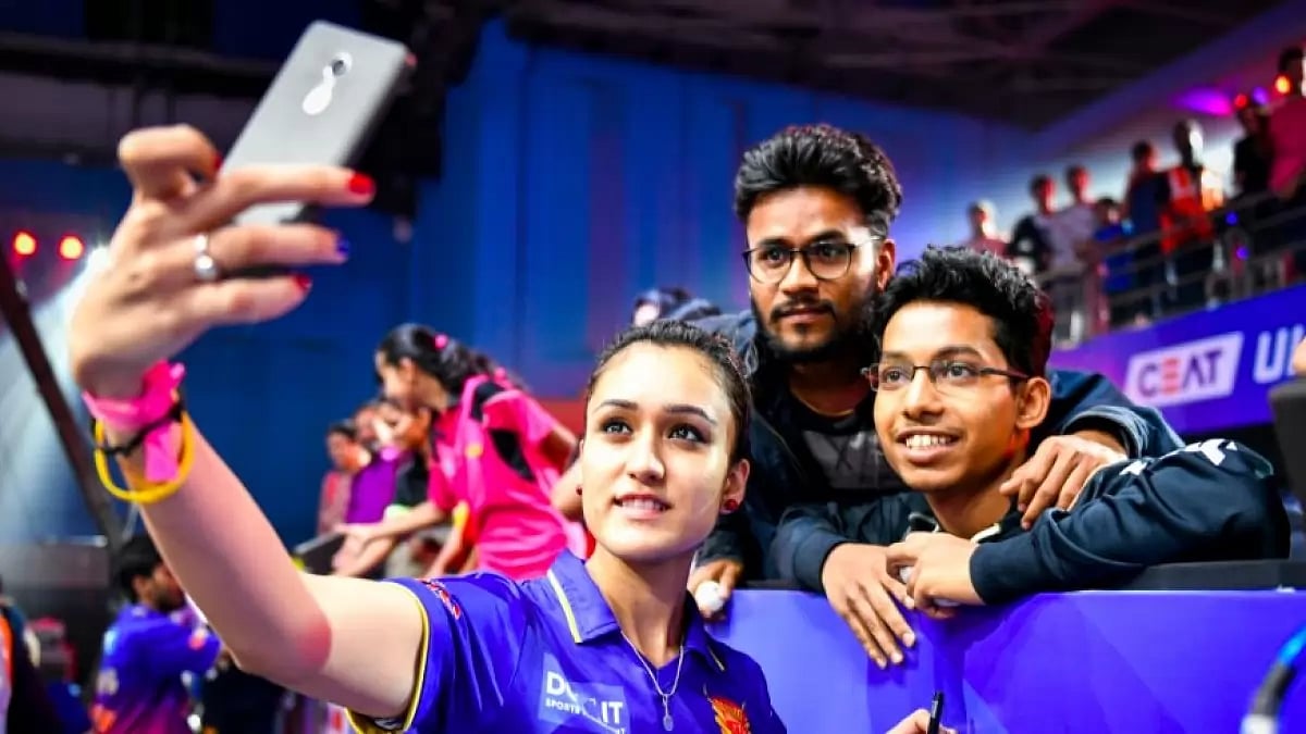 Ultimate Table Tennis : Star India paddler Manika Batra poses for a photo with supporters at the Ultimate Table Tennis tournament