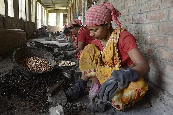 Representative Image/Getty Images : Indian women work at a cashew processing factory in Agartala