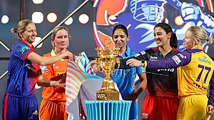 File photo/BCCI : Women's Premier League franchise captains pose with the trophy