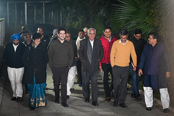 INDIA Alliance members of AAP and Congress party comes out after a meeting to discuss seat-sharing - Getty Images