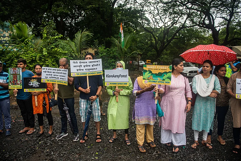 Protestors hold banners during the Save Aarey Movement in Mumbai - Pratik Chorge/Hindustan Times via Getty Images