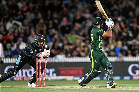 Aamer Jamal, right, of Pakistan is stumped by New Zealand's Devon Conway during the T20 international cricket match between the two teams in Hamilton