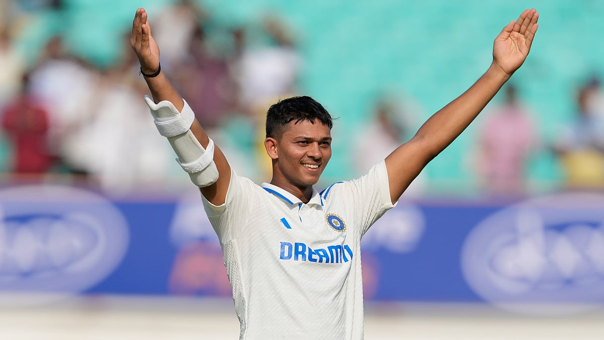AP/Ajit Solanki : India opener Yashasvi Jaiswal celebrates his century against England on Day 3 of the third Test in Rajkot. 