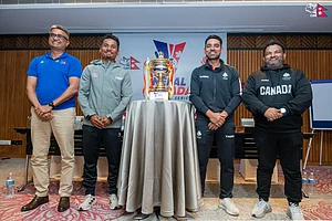 X/@CricketNep : Captains Rohit Paudel (second from left) and Saad bin Zafar (second from right) pose with the trophy ahead of the Nepal vs Canada ODI cricket series in Kirtipur.