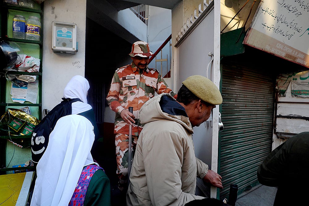 | Photo: PTI : NIA carries out raids in J&K