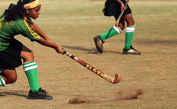 A school girl passes the ball during an under-14 school hockey tournament in Mumbai (representative image) - Getty Images