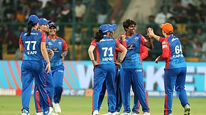 Photo: X/ @wplt20 : Delhi Capitals players celebrating a wicket of Royal Challengers Bangalore in WPL 2024 ON Thursday.