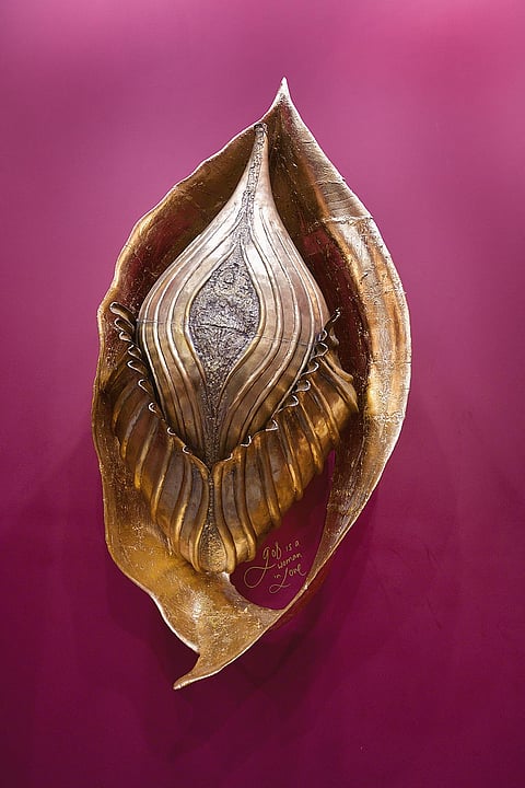 Shilo Shiva Suleman’s golden sculpture from her exhibit ‘God is a Woman in Love’