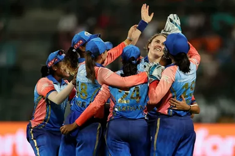 Mumbai Indians celebrate a Gujarat Giants wicket during match 3 of Women's Premier League 2024 at the M Chinnaswamy Stadium in Bengaluru. - WPL T20 website