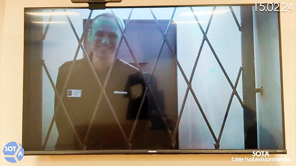 AP : FILE This photo taken from video released by Russian Federal Penitentiary Service via SOTAVISION shows Russian opposition leader Alexei Navalny appears via a video link from the Arctic penal colony