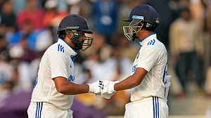 AP/Ajit Solanki : India's captain Rohit Sharma, left, and Yashasvi Jaiswal touch gloves as the share the crease on the third day of the fourth cricket Test match.