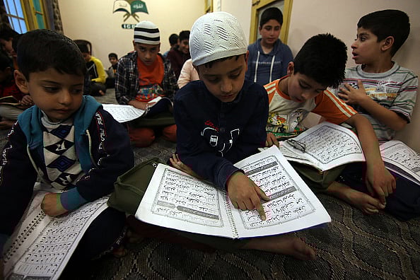 Getty Images : Students attending Quran classes at a madrasa