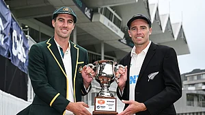 X/BlackCaps : Captains Pat Cummins (left) and Tim Southee pose with the trophy ahead of the first Test in Wellington.